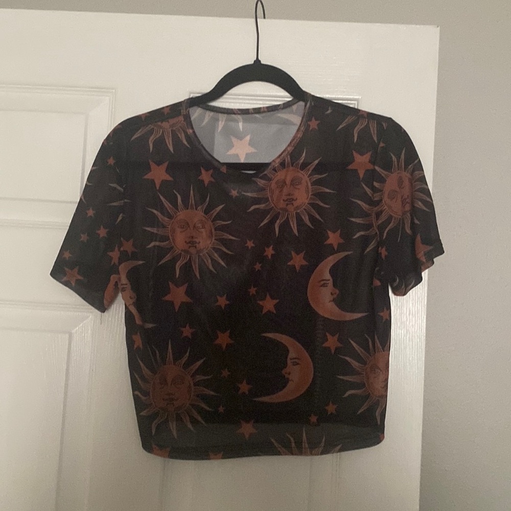 sheer black top w/ sun moon and stars